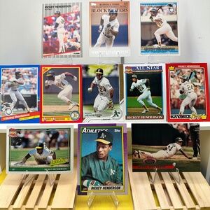 Rickey Henderson vintage lot of 11 (As, Yankees)